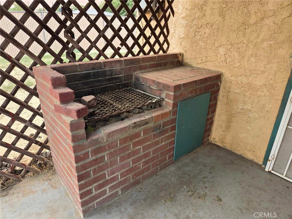 36614 Leona Road, Unit U12 Barstow, CA 92311 - Photo 20 of 24 Built-in BBQ back house, front porch.
