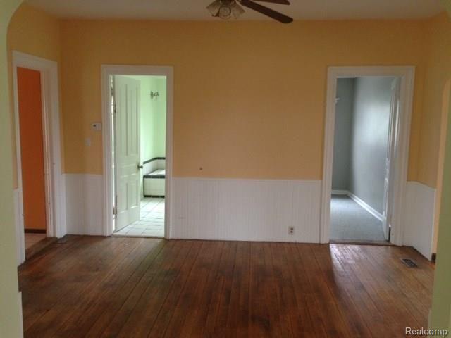 1640 County Farm Road Howell, MI 48843 - Photo 11 of 38 wood floors / ceiling fan