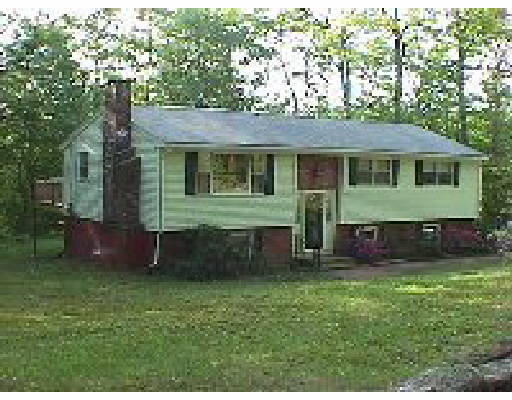 227 Glenwood Road Rutland, MA 01543 - Photo 1 of 1 a view of a house with a yard