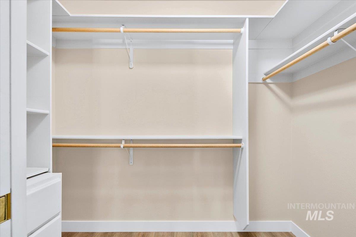 725 North Eagle Road Eagle, ID 83616 - Photo 29 of 45 Custom closet system featuring white shelving units