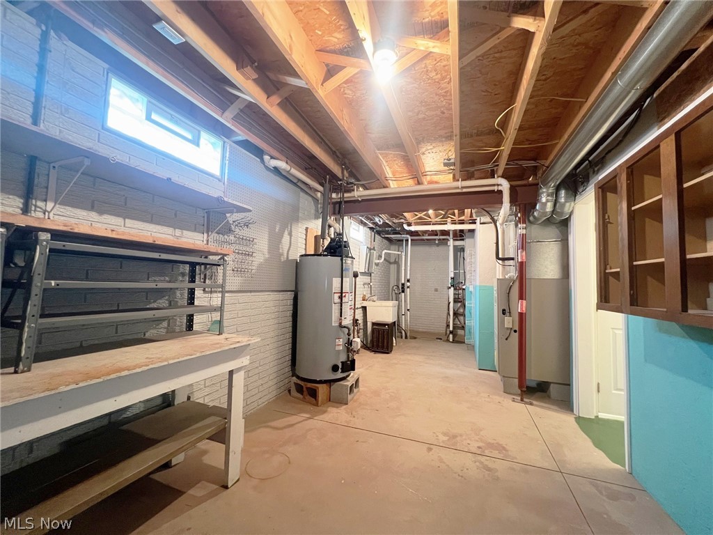 5203 Ridgeland Street Lorain, OH 44055 - Photo 26 of 39 Basement with gas water heater