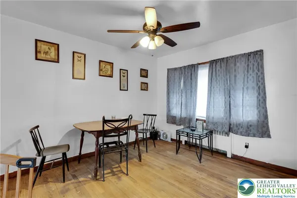 a workspace with furniture and window