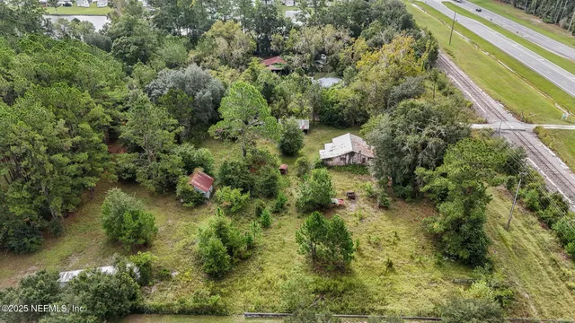 a view of a house with a tree