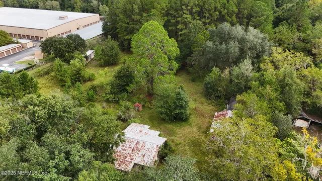a view of a swimming pool and an outdoor space