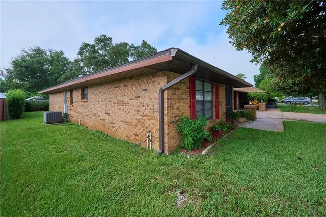 a backyard of a house with lots of green space
