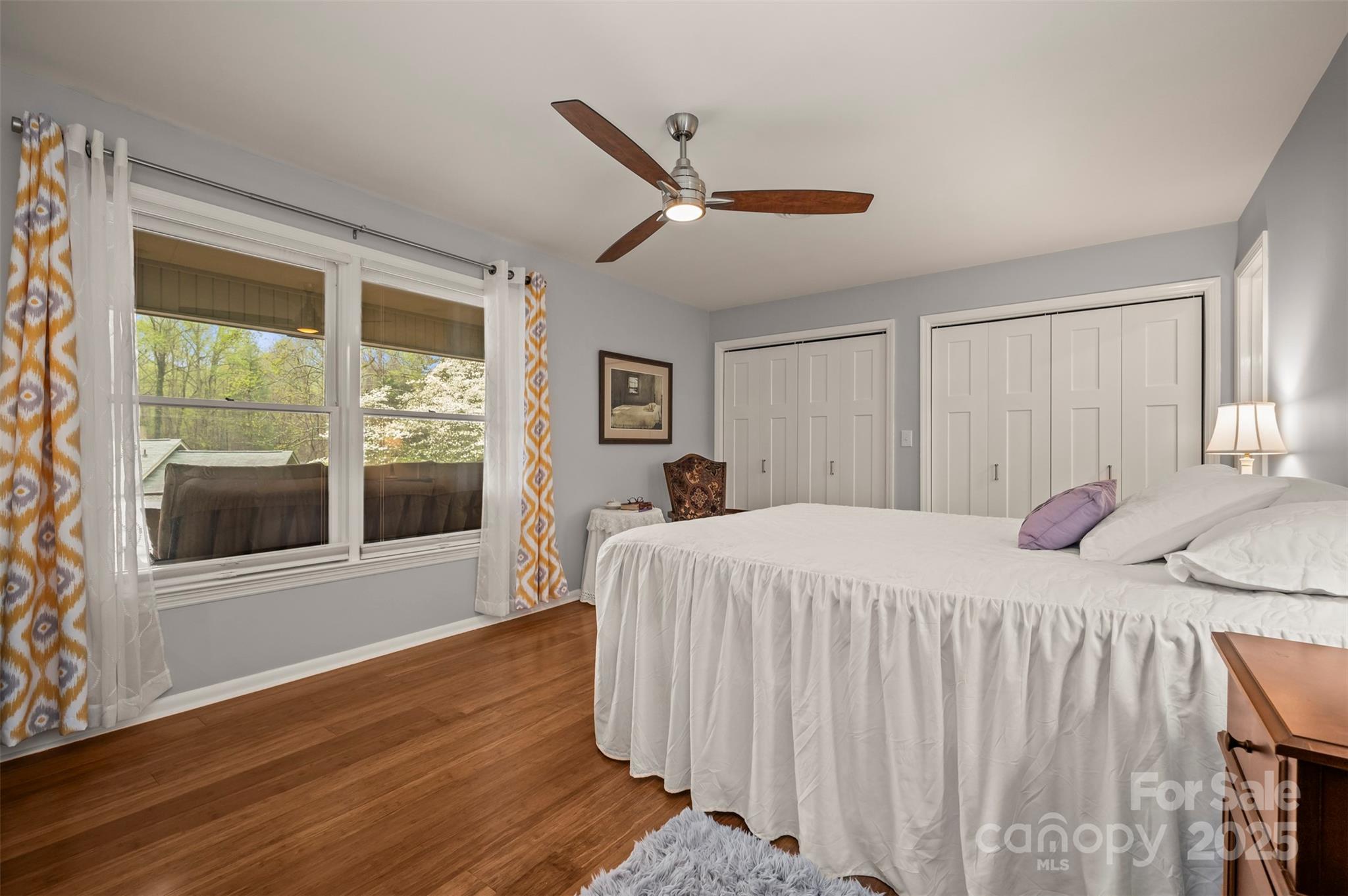 44 Jervey Road, Unit 3A Tryon, NC 28782 - Photo 20 of 29 a bedroom with a large bed and a large window