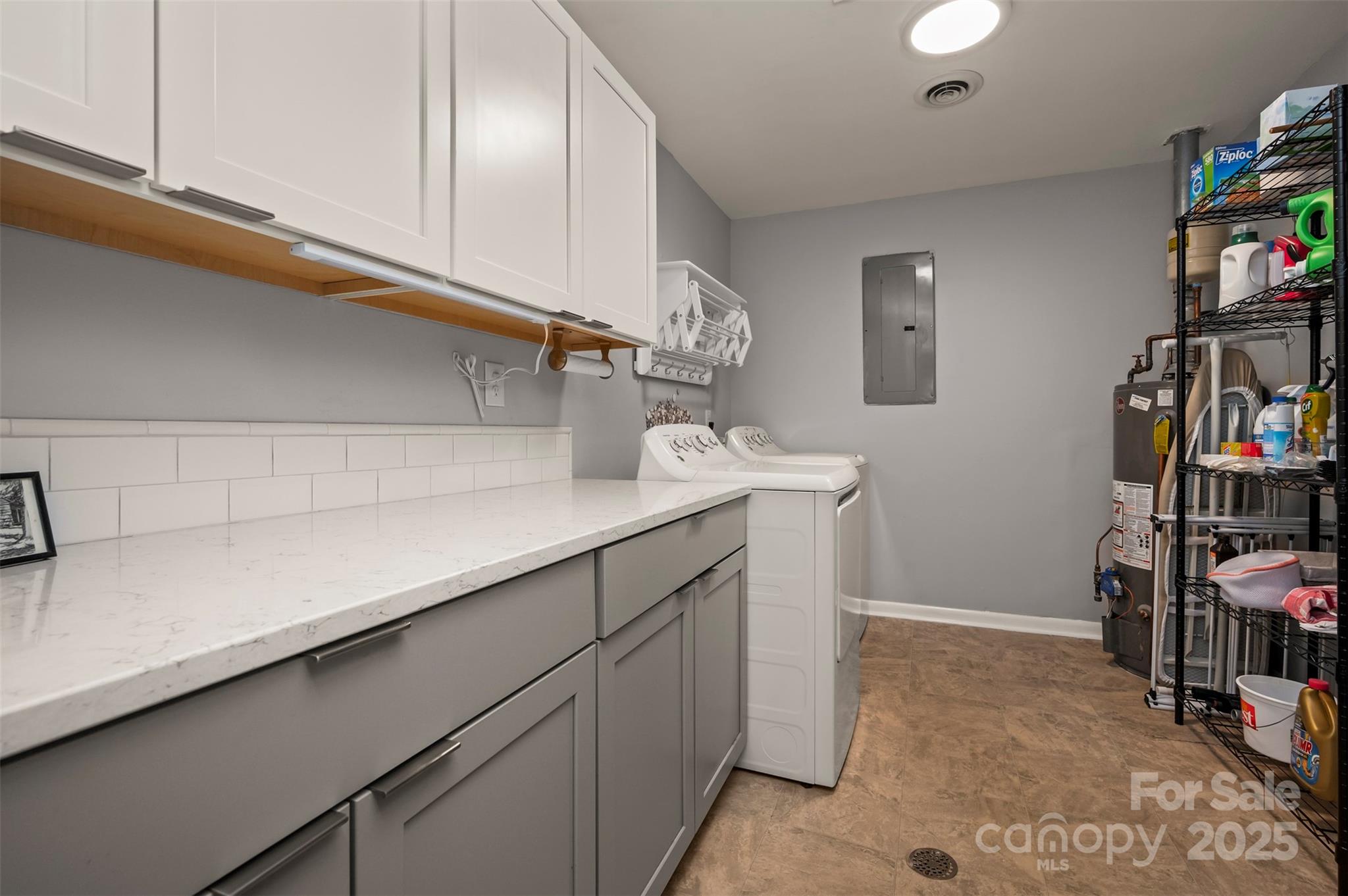 44 Jervey Road, Unit 3A Tryon, NC 28782 - Photo 26 of 29 a utility room with cabinets