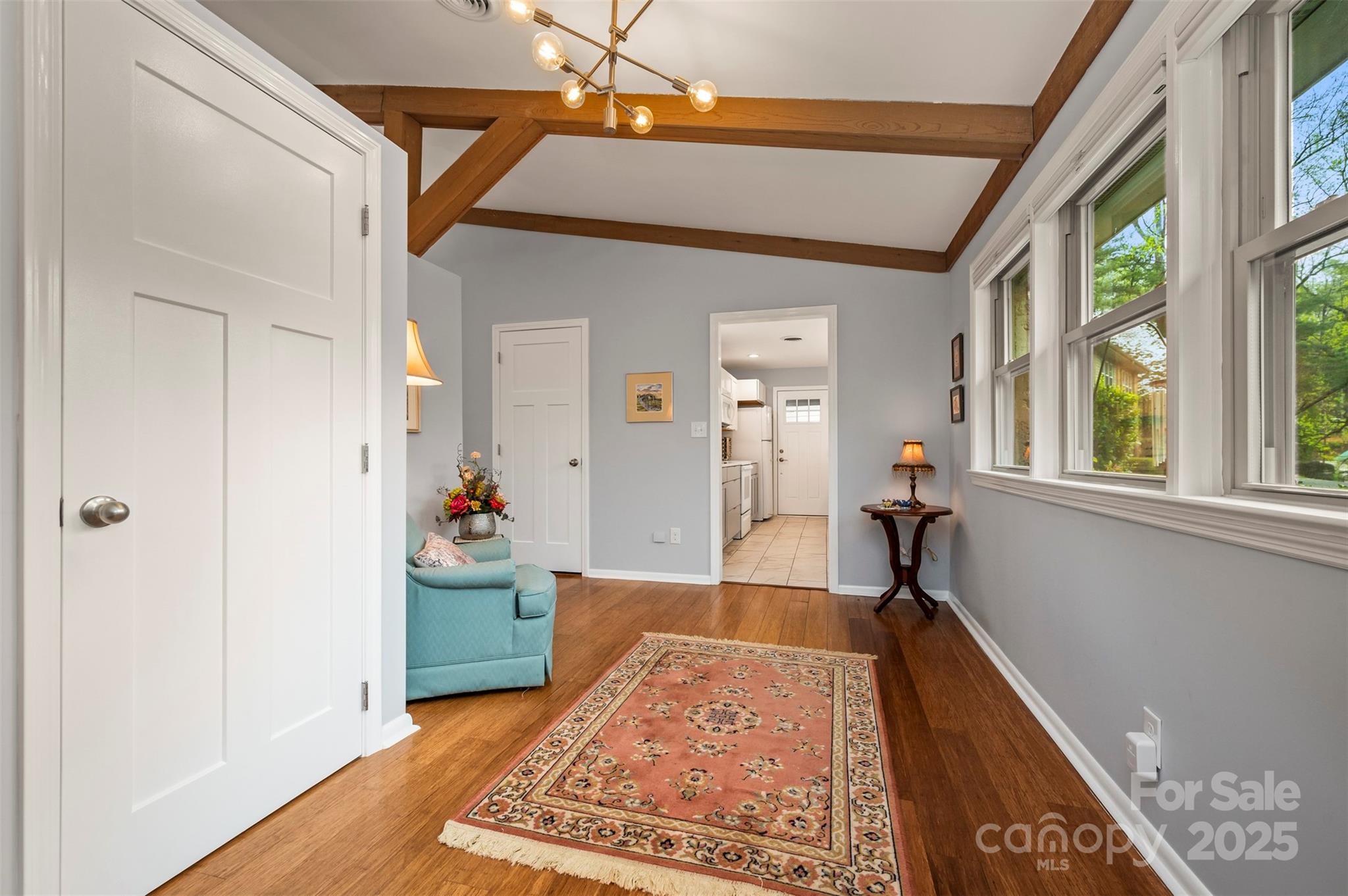 44 Jervey Road, Unit 3A Tryon, NC 28782 - Photo 4 of 29 a very nice looking room with wooden floor and a window