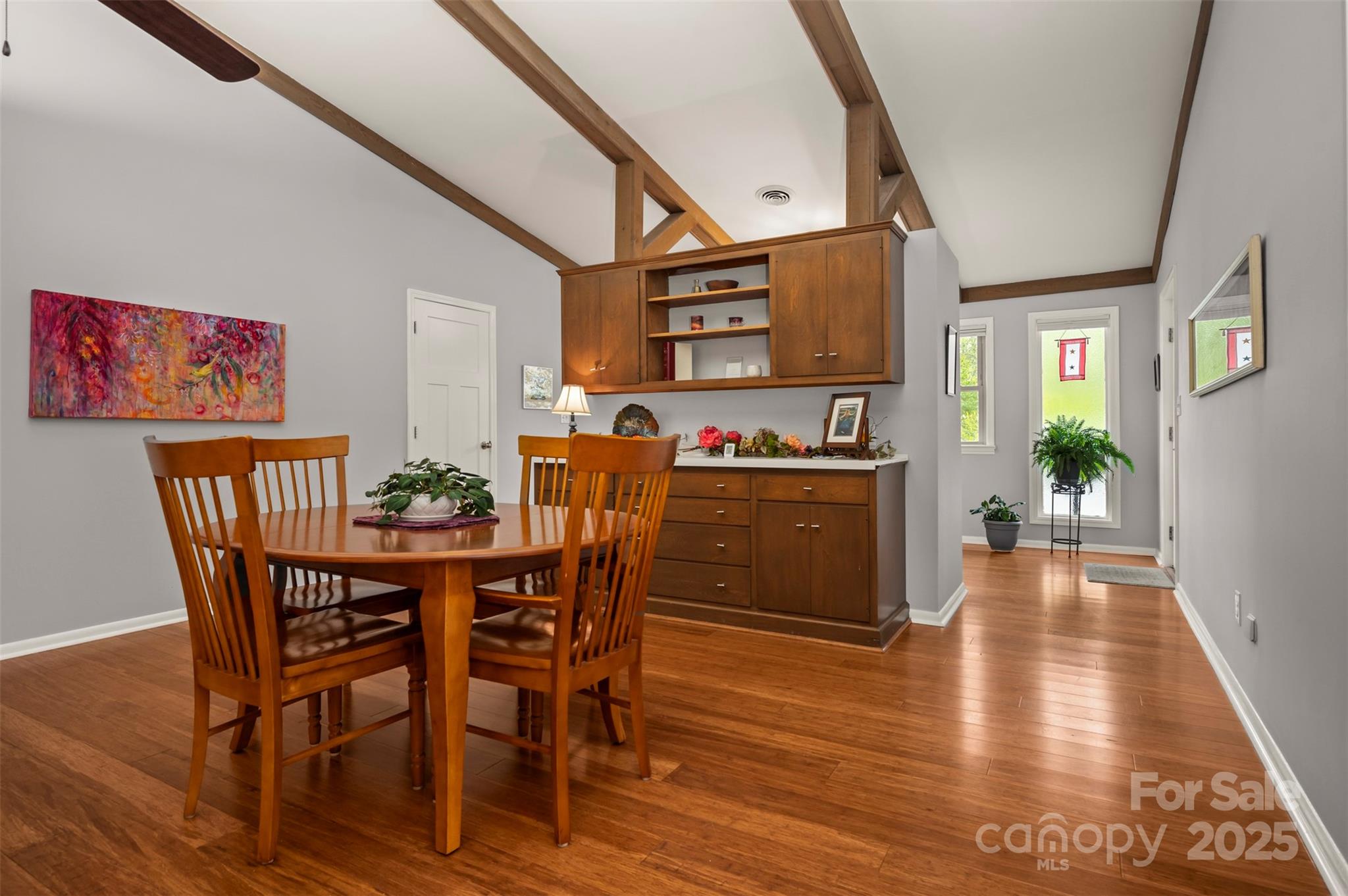 44 Jervey Road, Unit 3A Tryon, NC 28782 - Photo 6 of 29 a view of a dining room with furniture and wooden floor