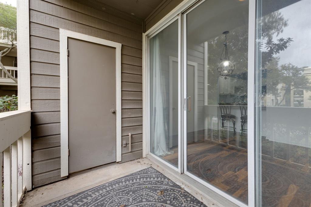 5310 Keller Springs Road, Unit 413 Dallas, TX 75248 - Photo 20 of 20 a view of a bathroom with a glass door