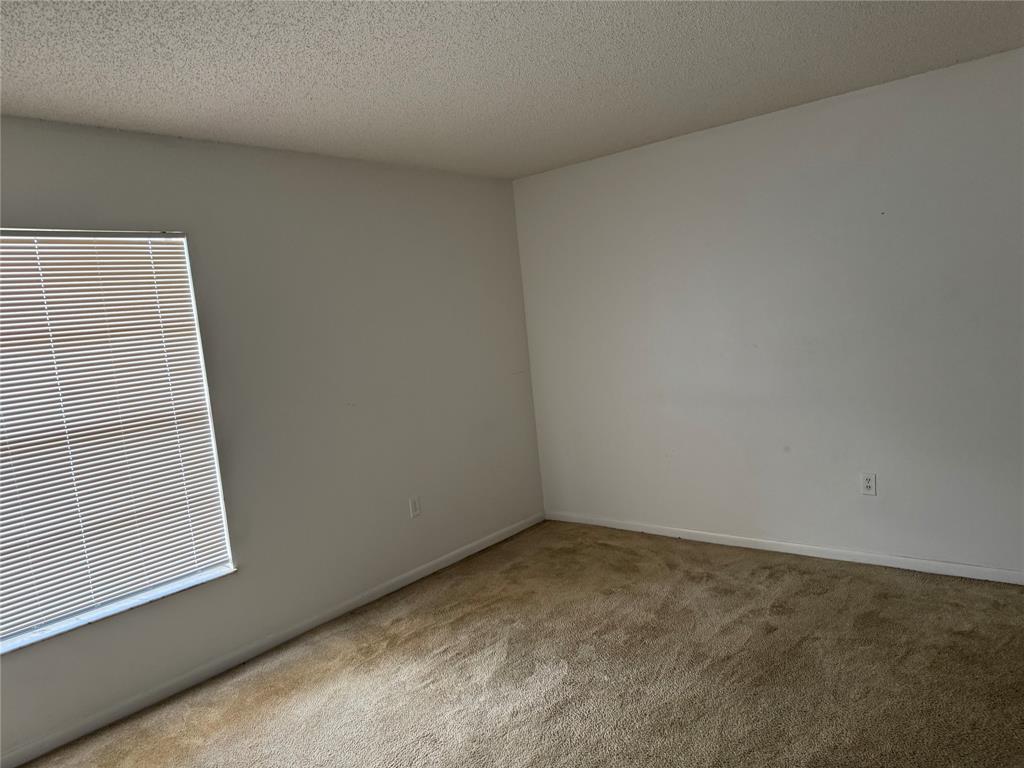 3650 Environ Boulevard, Unit 308 Lauderhill, FL 33319 - Photo 3 of 14 an empty room with a window