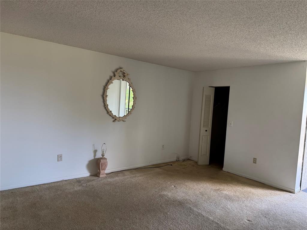 3650 Environ Boulevard, Unit 308 Lauderhill, FL 33319 - Photo 5 of 14 a view of a room with a hanging light and kitchen