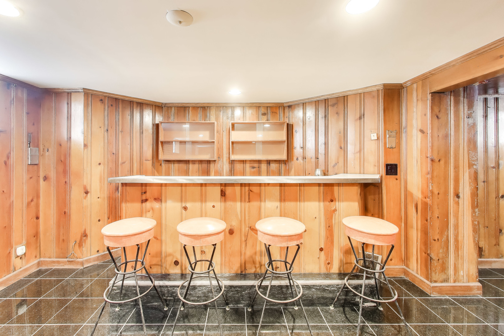6230 North Troy Street Chicago, IL 60659 - Photo 27 of 38 a bathroom with a sink and a mirror