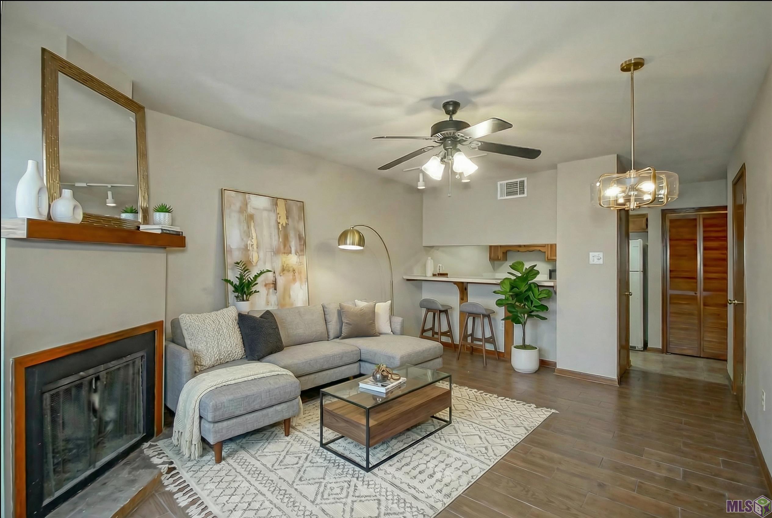 5110 Butter Creek Lane, Unit 5 Baton Rouge, LA 70809 - Photo 2 of 20 Huge living area with cozy fireplace