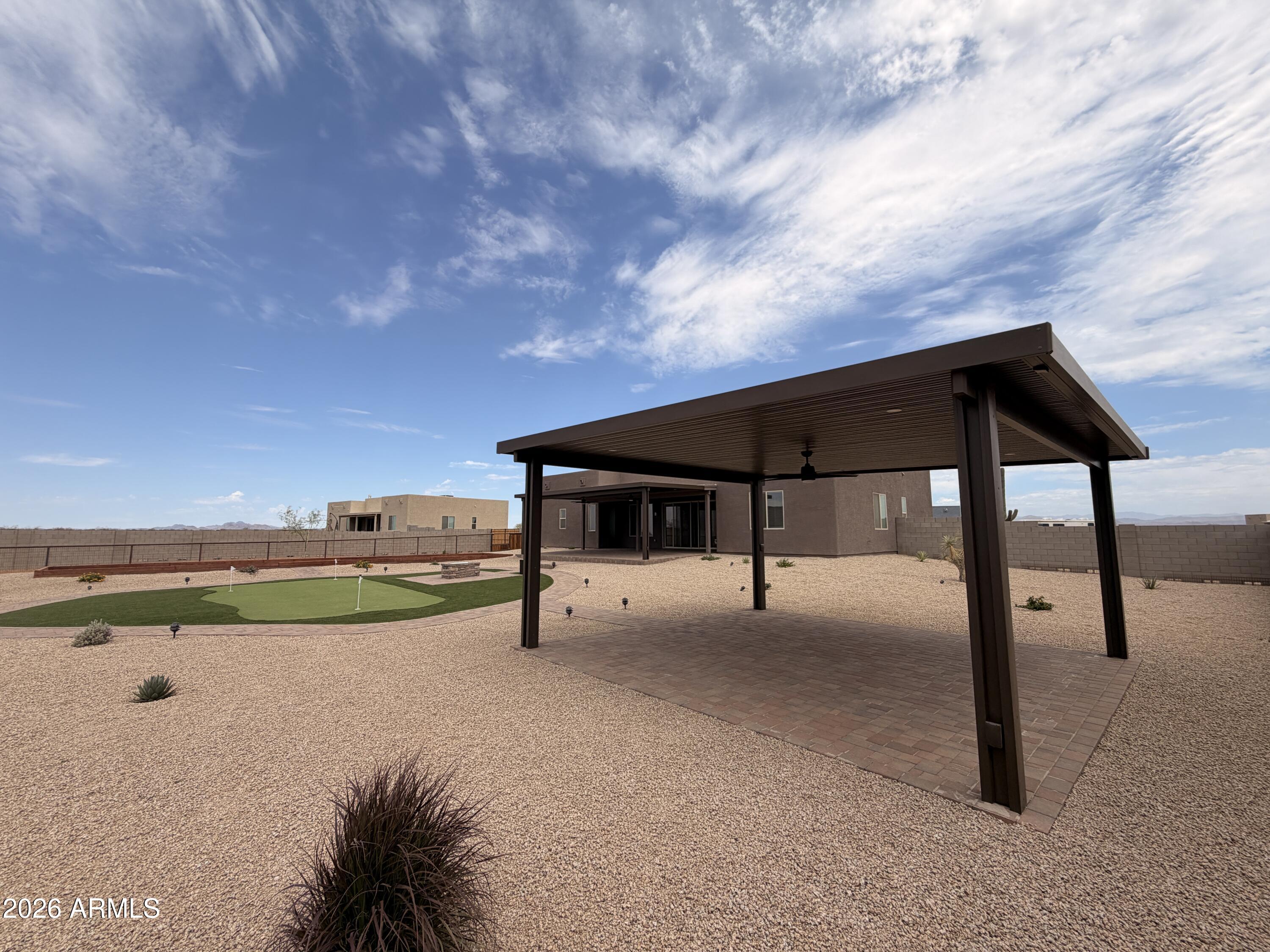 23175 West Skinner Road Wittmann, AZ 85361 - Photo 22 of 25 a view of swimming pool with seating space