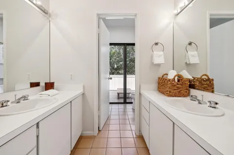 a view of a patio with wooden floor