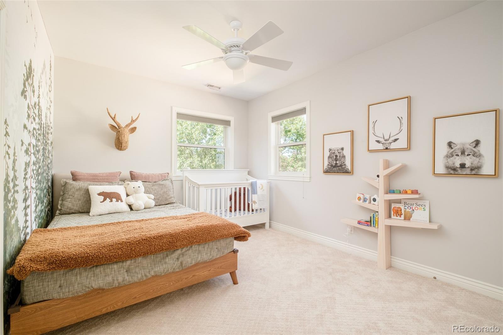 3234 Stuart Street Denver, CO 80212 - Photo 17 of 41 a bedroom with a bed a wall painting and a window