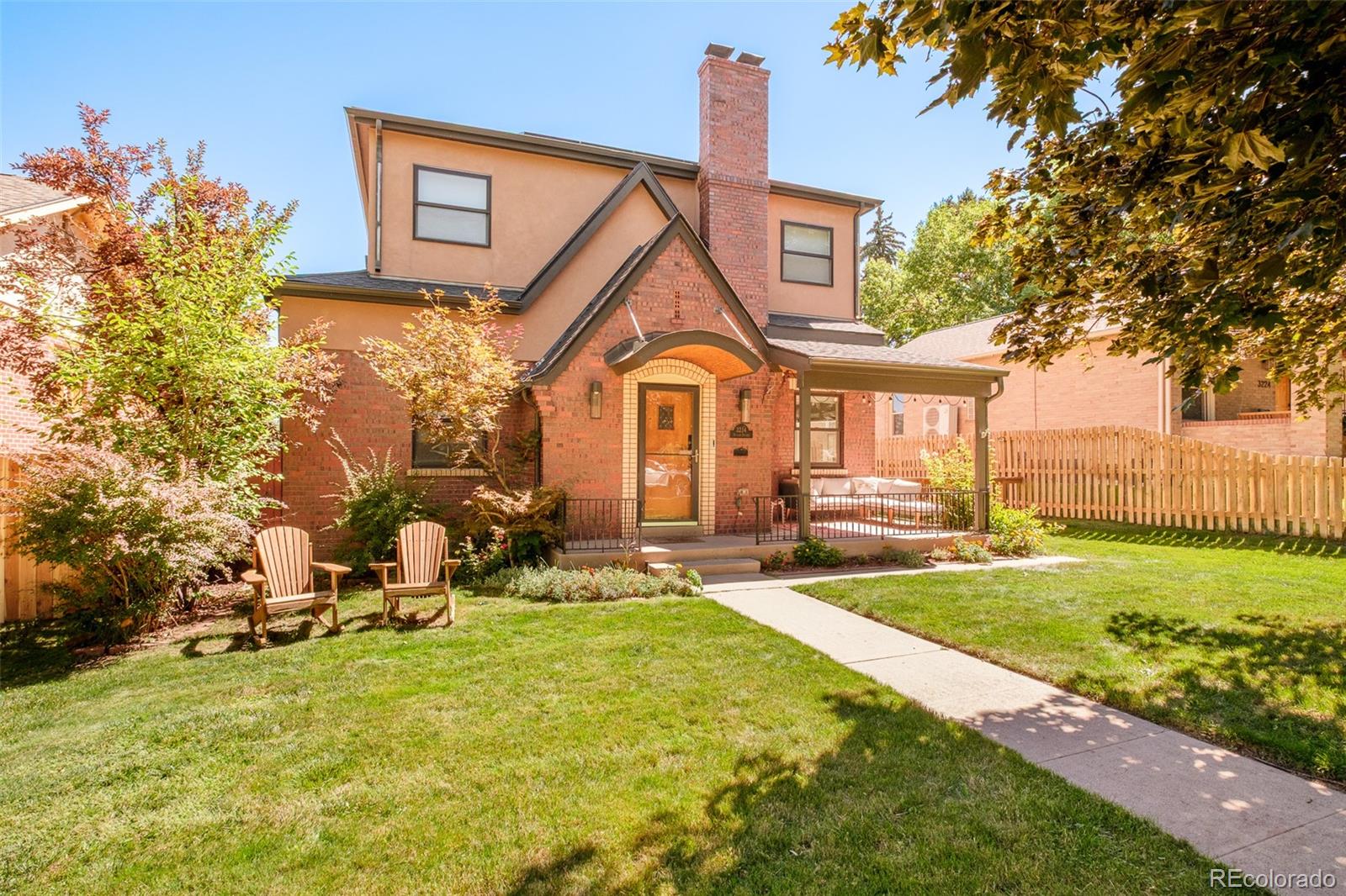 3234 Stuart Street Denver, CO 80212 - Photo 2 of 41 a front view of a house with garden