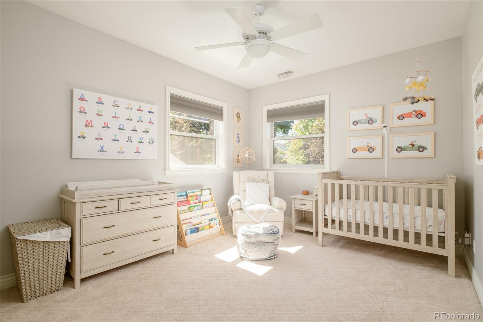 3234 Stuart Street Denver, CO 80212 - Photo 25 of 41 a bedroom with a baby bed couch and a window