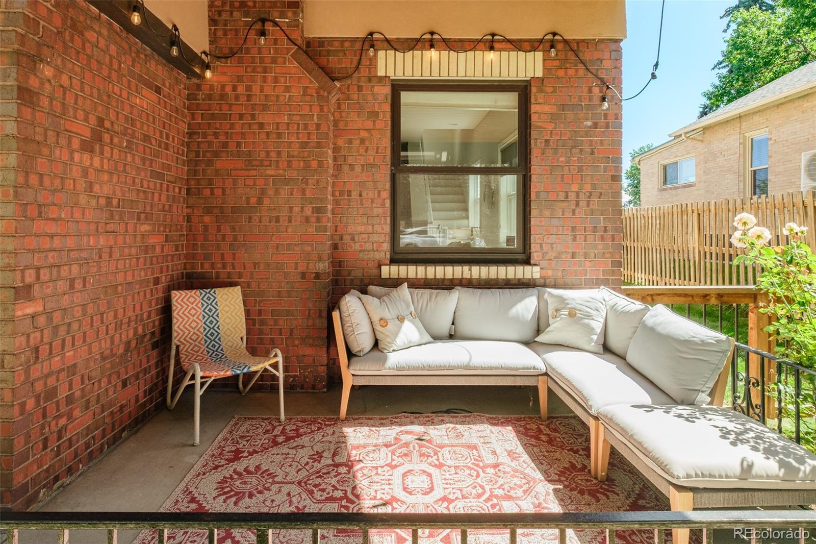 3234 Stuart Street Denver, CO 80212 - Photo 3 of 41 a building outdoor space with patio furniture