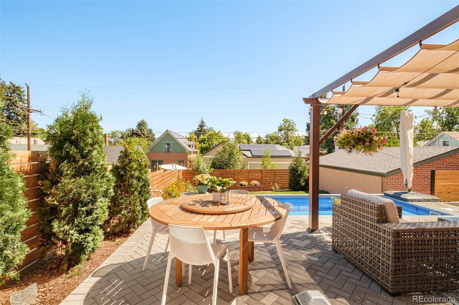 3234 Stuart Street Denver, CO 80212 - Photo 31 of 41 a balcony with table and chairs