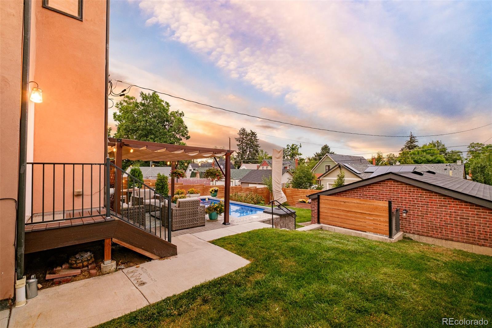 3234 Stuart Street Denver, CO 80212 - Photo 36 of 41 a view of a garden with lawn chairs