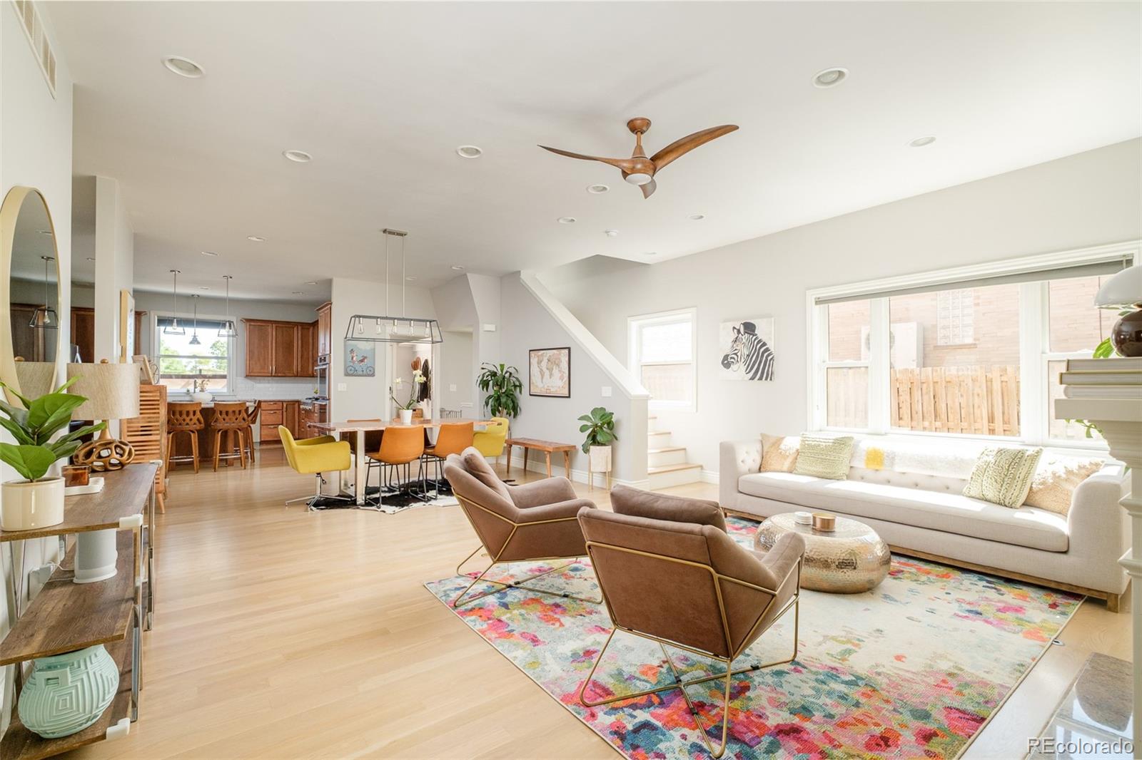 3234 Stuart Street Denver, CO 80212 - Photo 4 of 41 a living room with furniture and a large window