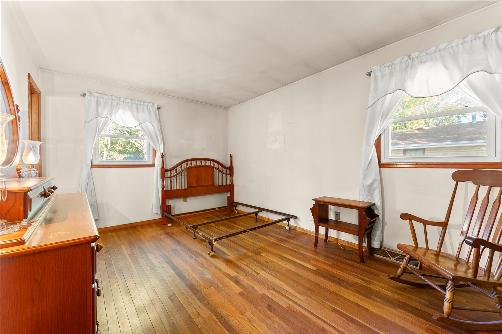 708 Jackson Street Monticello, IL 61856 - Photo 13 of 28 a living room with furniture a rug and a window