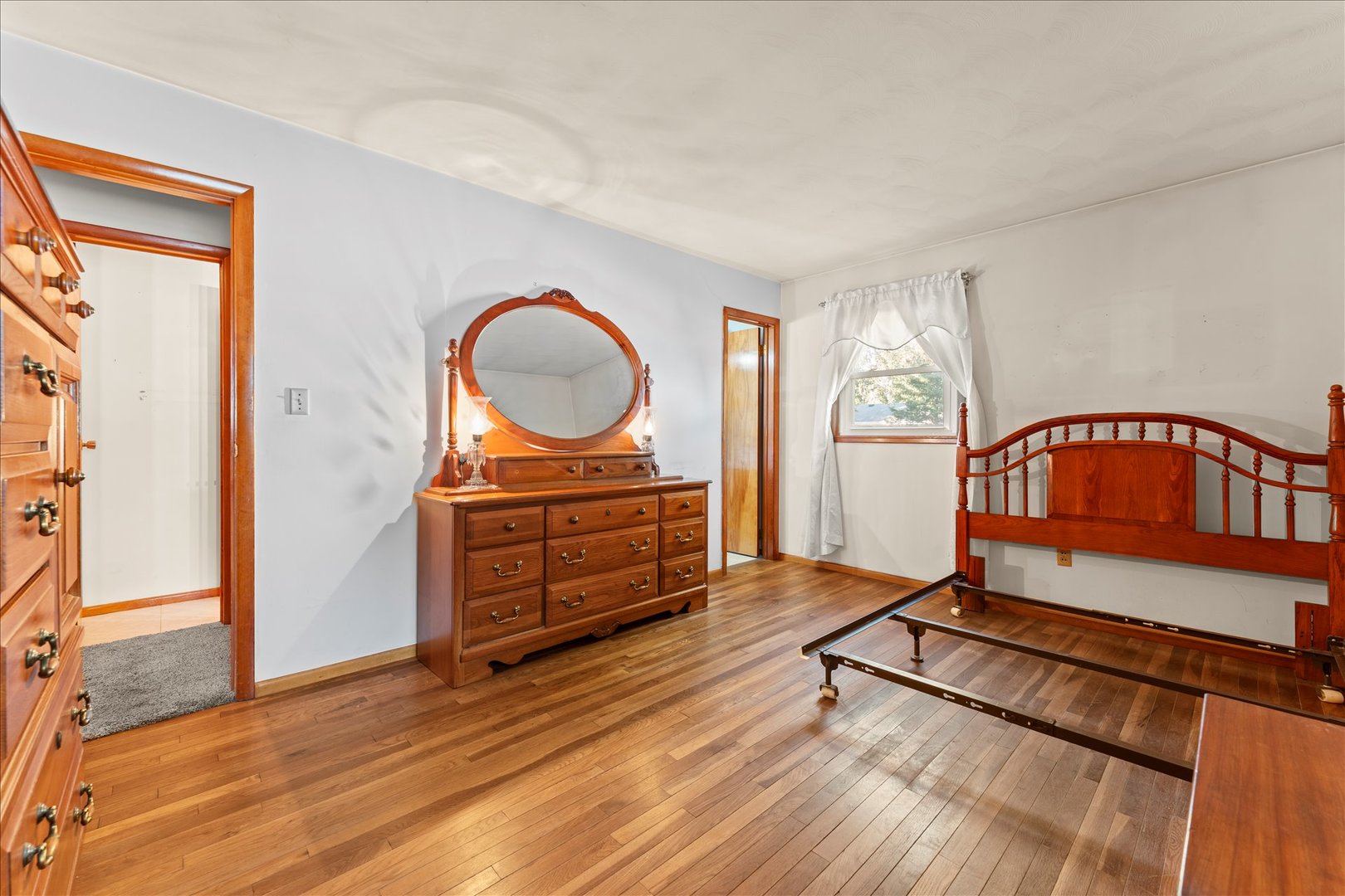 708 Jackson Street Monticello, IL 61856 - Photo 14 of 28 a living room with furniture a rug and a window