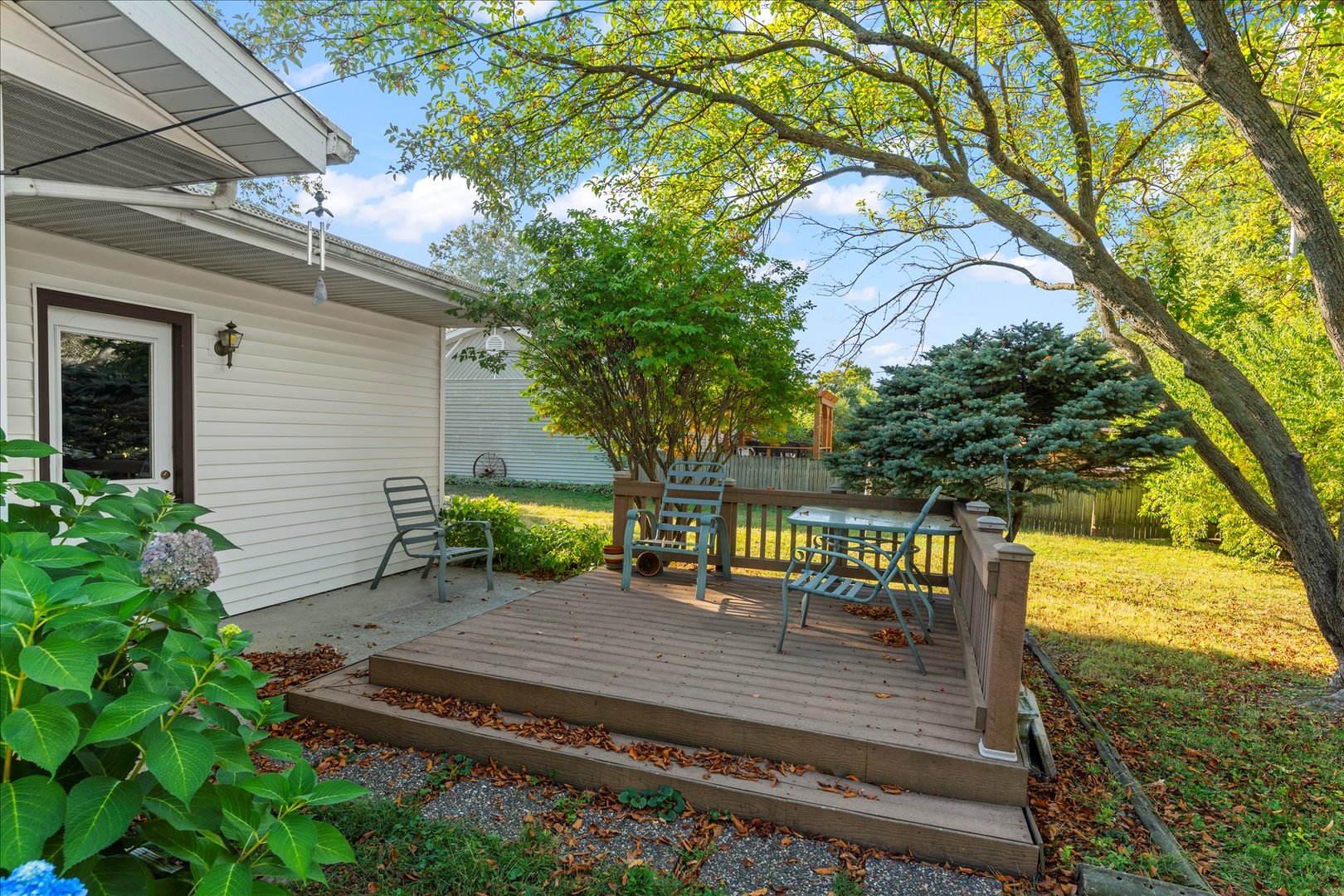 708 Jackson Street Monticello, IL 61856 - Photo 24 of 28 a view of a bench in a patio