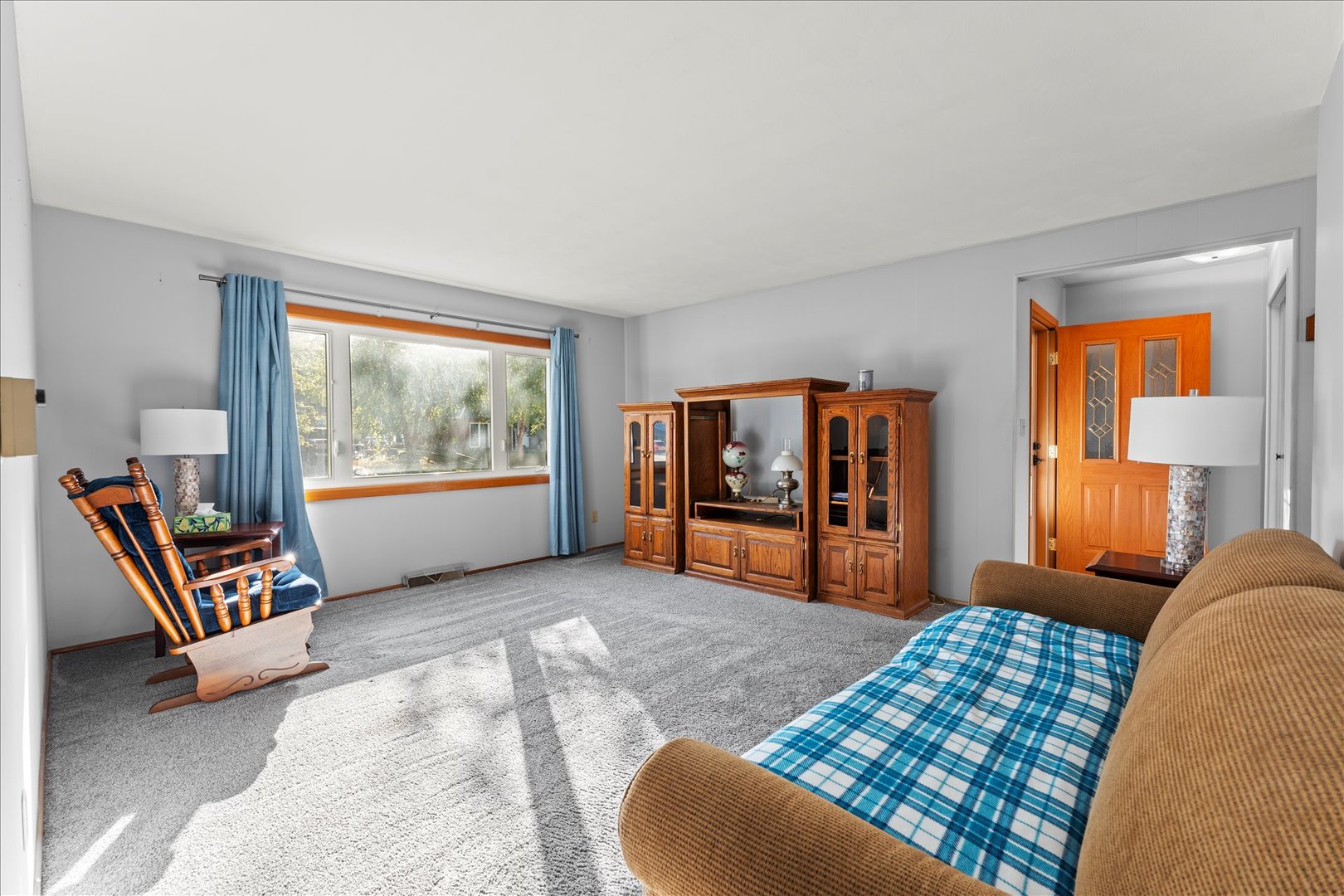 708 Jackson Street Monticello, IL 61856 - Photo 5 of 28 a bedroom with furniture and a window