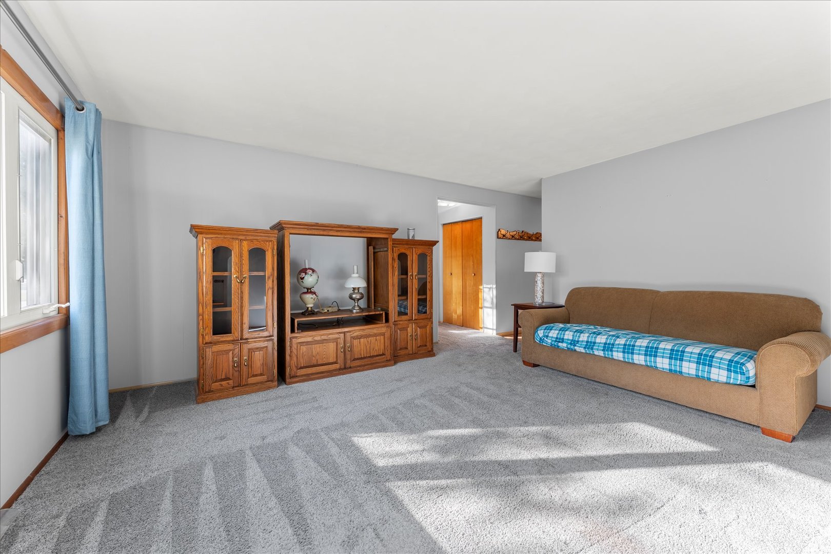 708 Jackson Street Monticello, IL 61856 - Photo 6 of 28 a bedroom with a bed and window