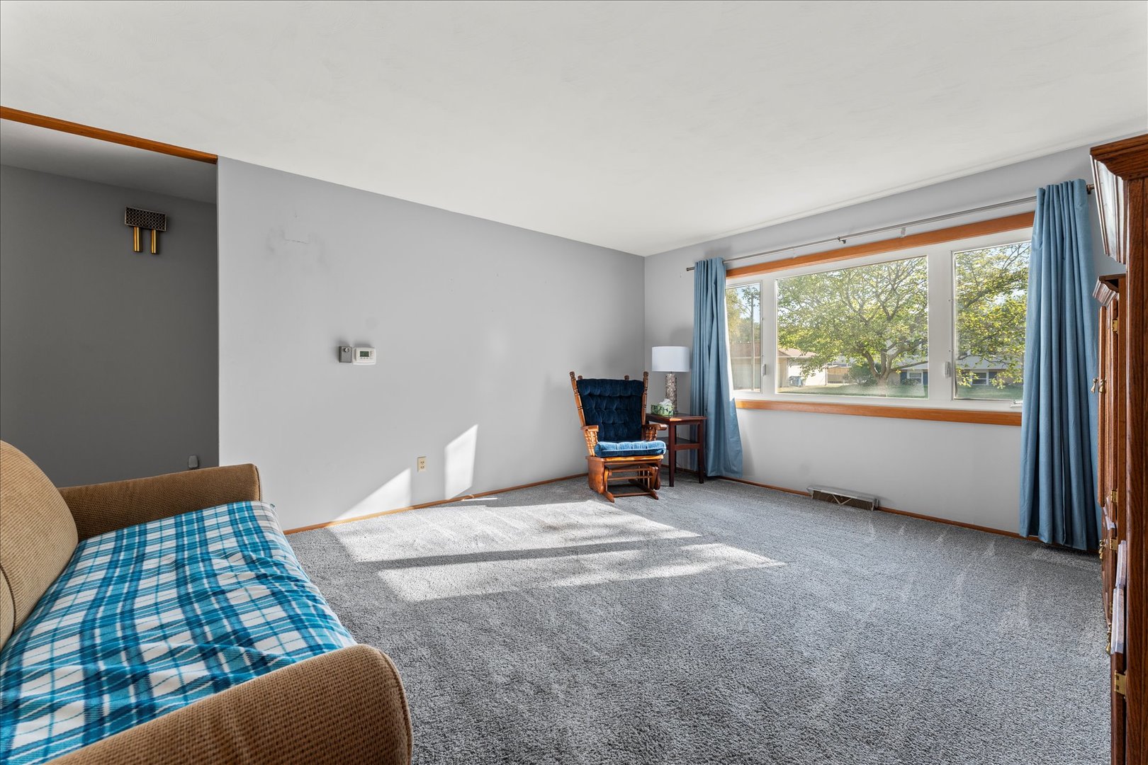 708 Jackson Street Monticello, IL 61856 - Photo 7 of 28 a bedroom with furniture and a window