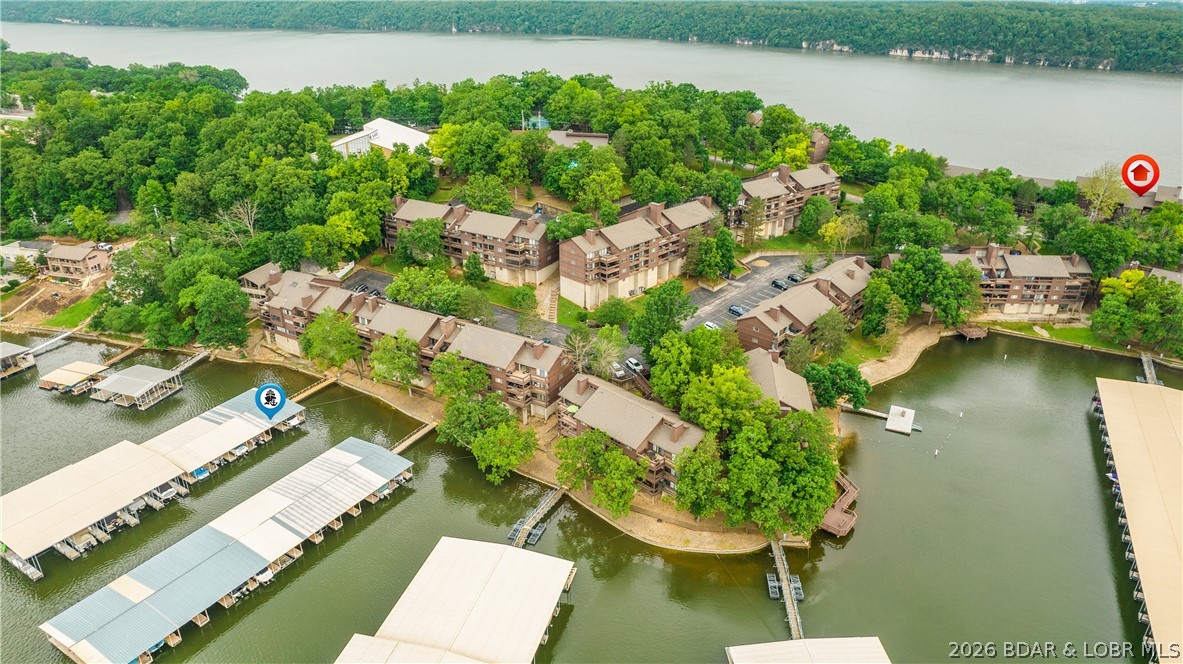 5940 Baydy Peak Road, Unit 123 Osage Beach, MO 65065 - Photo 19 of 43 Dock is in protected cove