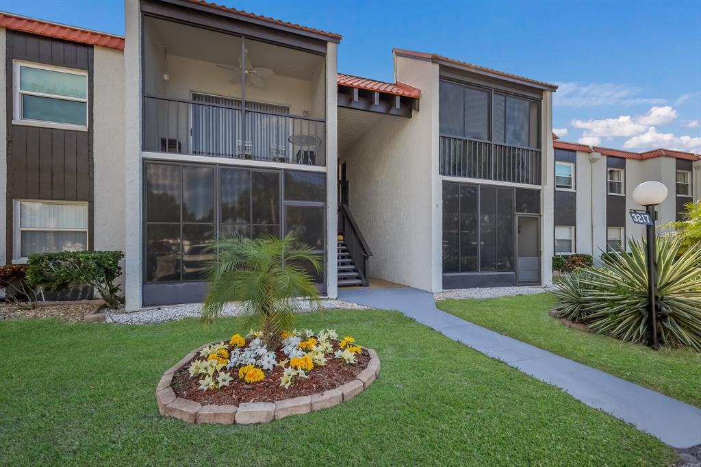 3217 South Beneva Road, Unit 101 Sarasota, FL 34232 - Photo 1 of 1 Assigned parking space directly outside the unit entrance.