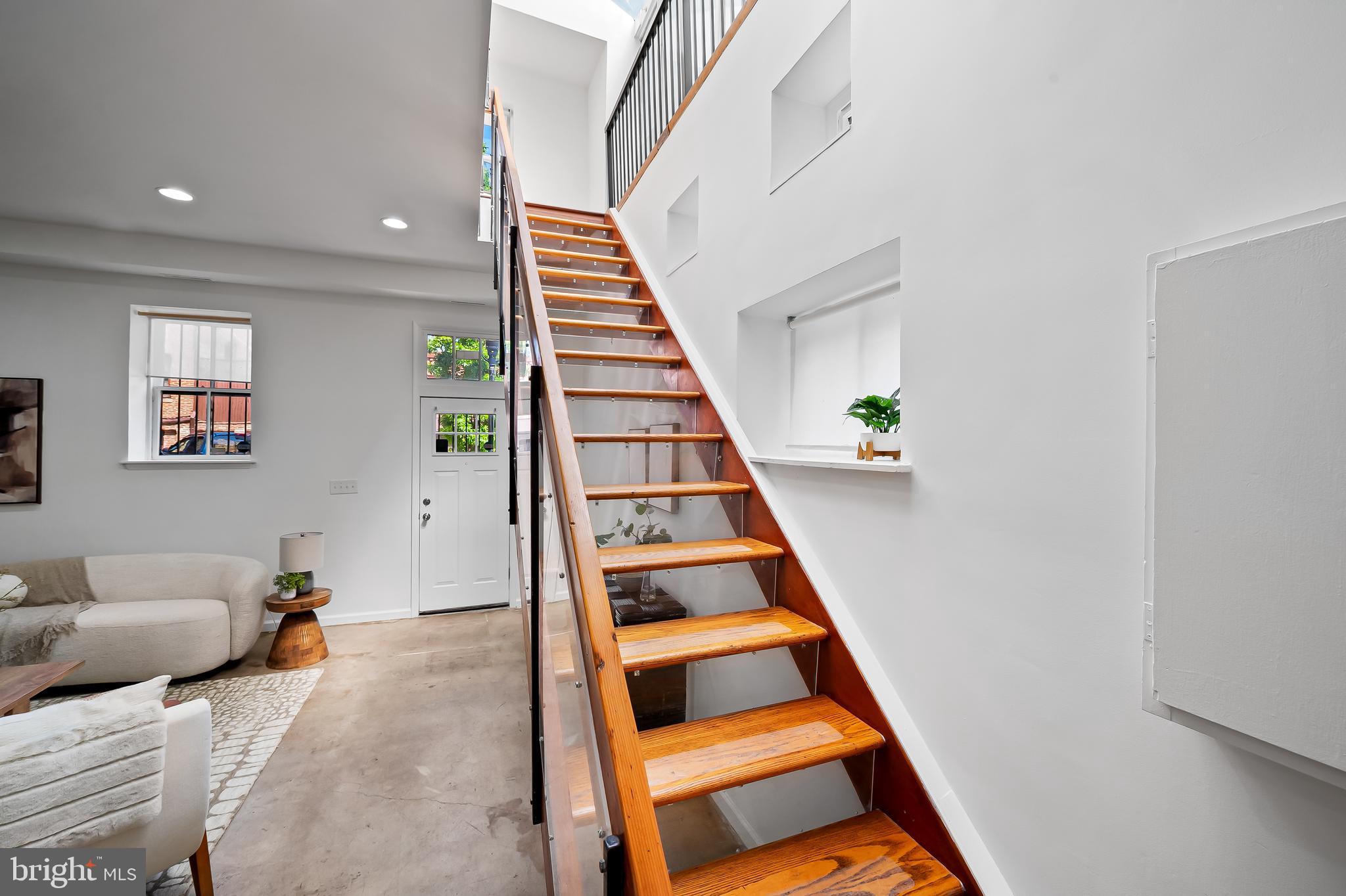 307 Mosher Street Baltimore, MD 21217 - Photo 19 of 30 a view of entryway and hall with wooden floor