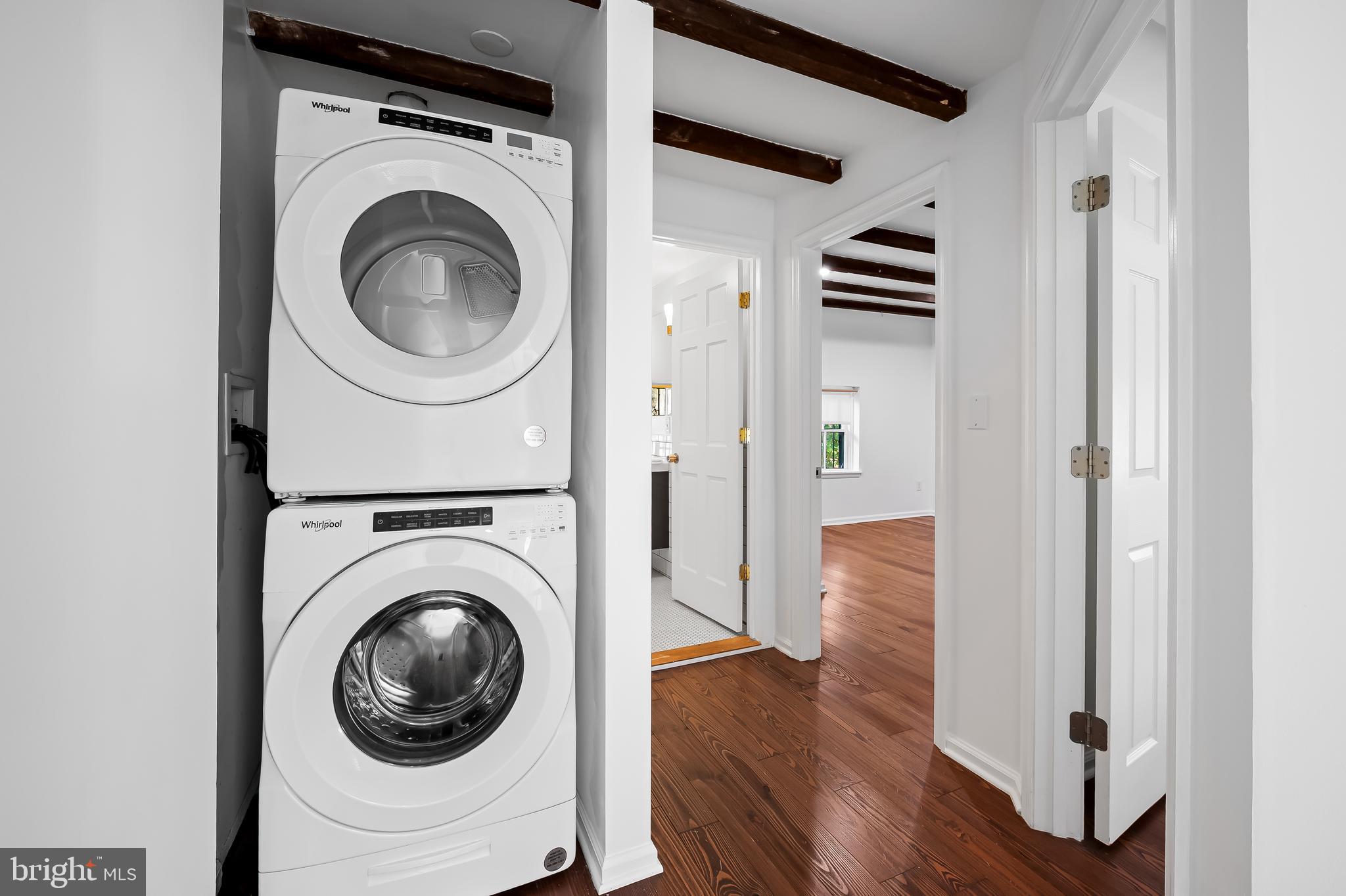 307 Mosher Street Baltimore, MD 21217 - Photo 26 of 30 a view of a hallway with washer and dryer