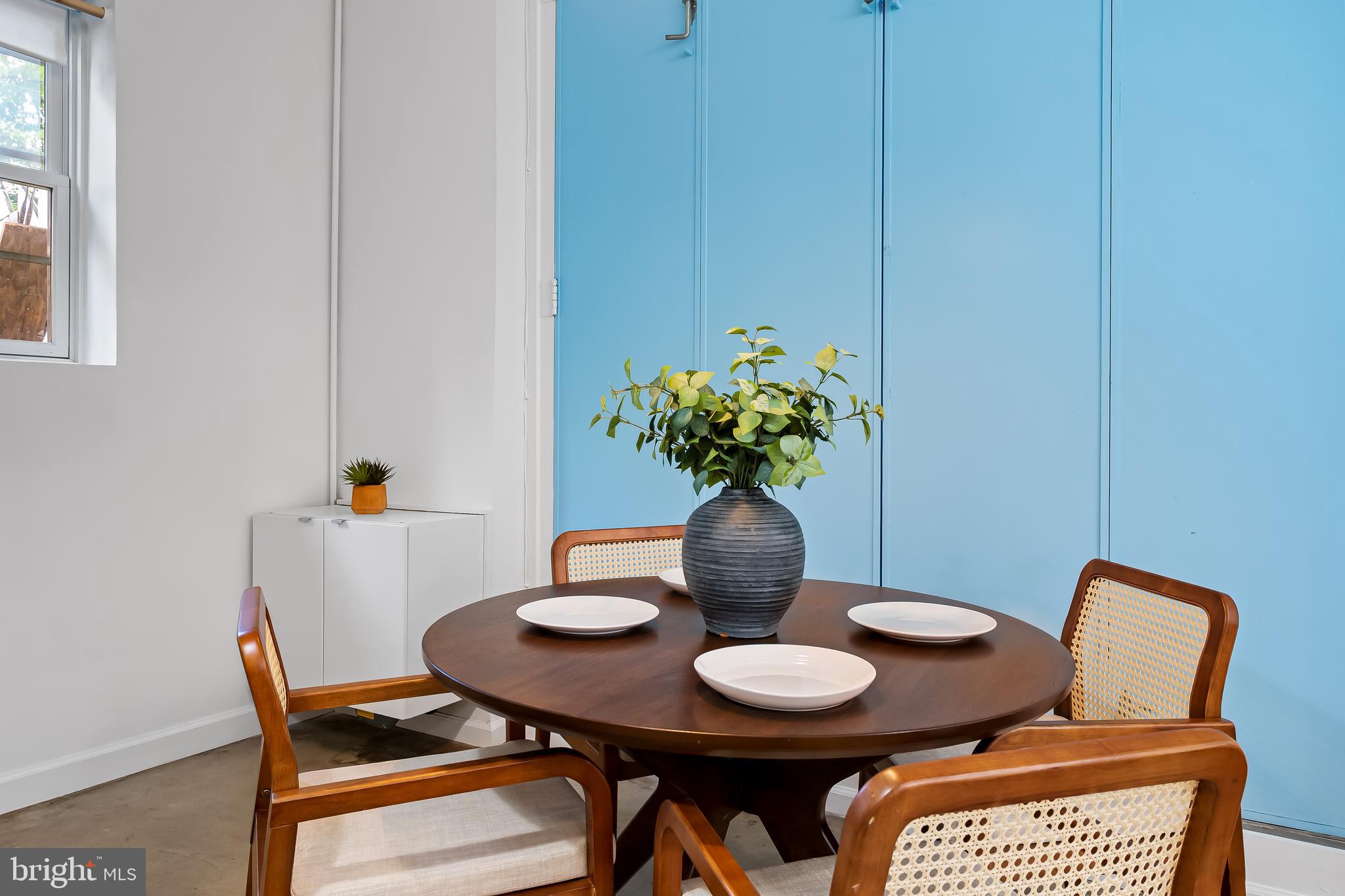307 Mosher Street Baltimore, MD 21217 - Photo 9 of 30 a table and chairs in a room
