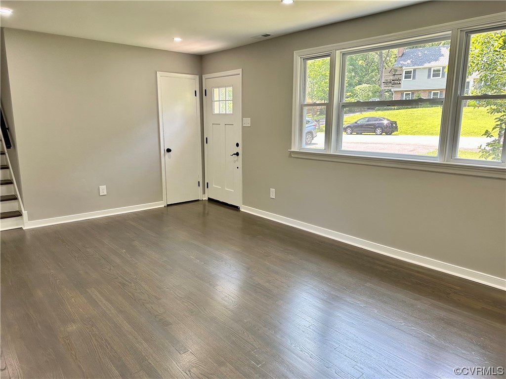 1035 Southam Drive Richmond, VA 23235 - Photo 11 of 43 an empty room with wooden floor and windows