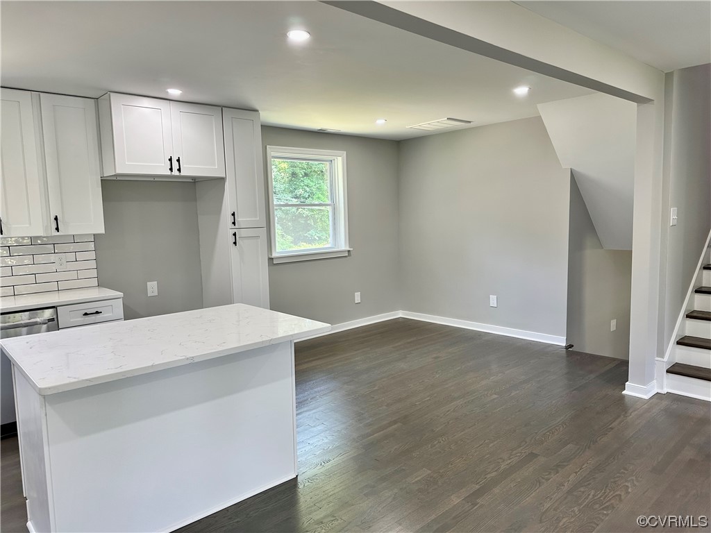 1035 Southam Drive Richmond, VA 23235 - Photo 14 of 43 a kitchen with a wooden floor and window