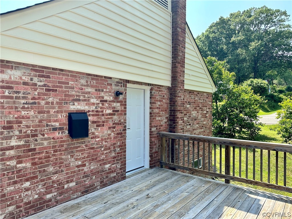 1035 Southam Drive Richmond, VA 23235 - Photo 18 of 43 a backyard of a house with wooden floor