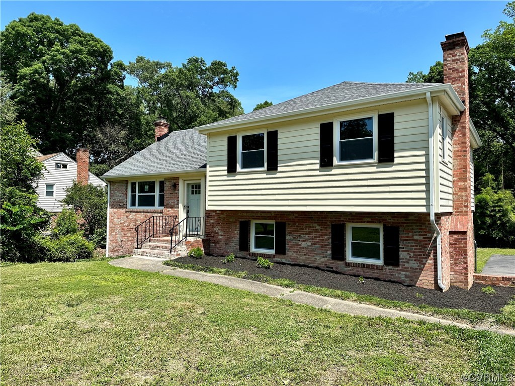 1035 Southam Drive Richmond, VA 23235 - Photo 3 of 43 a view of a house with a yard