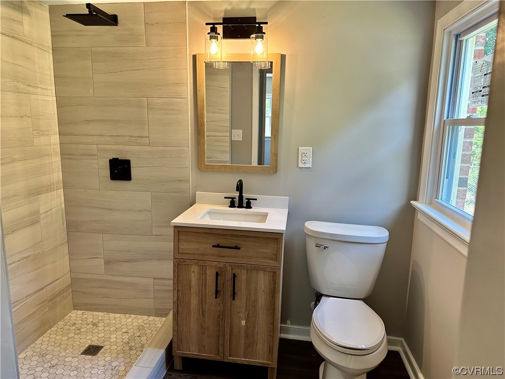 1035 Southam Drive Richmond, VA 23235 - Photo 31 of 43 a bathroom with a sink a toilet and shower
