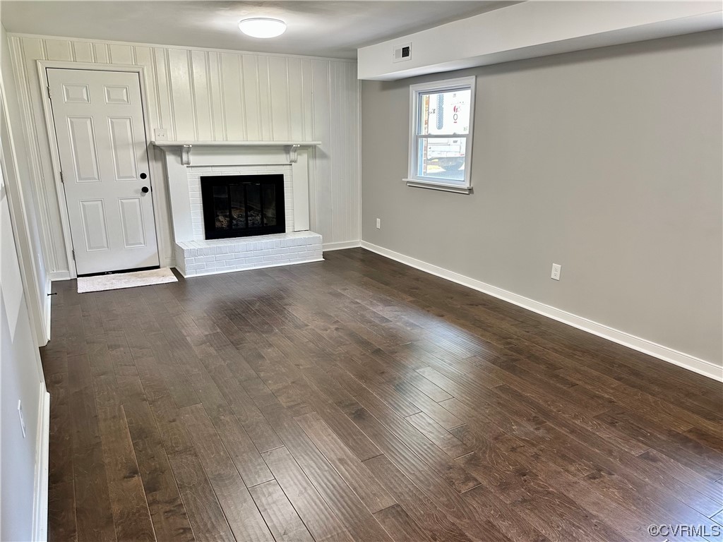 1035 Southam Drive Richmond, VA 23235 - Photo 33 of 43 a view of an empty room with wooden floor and a window