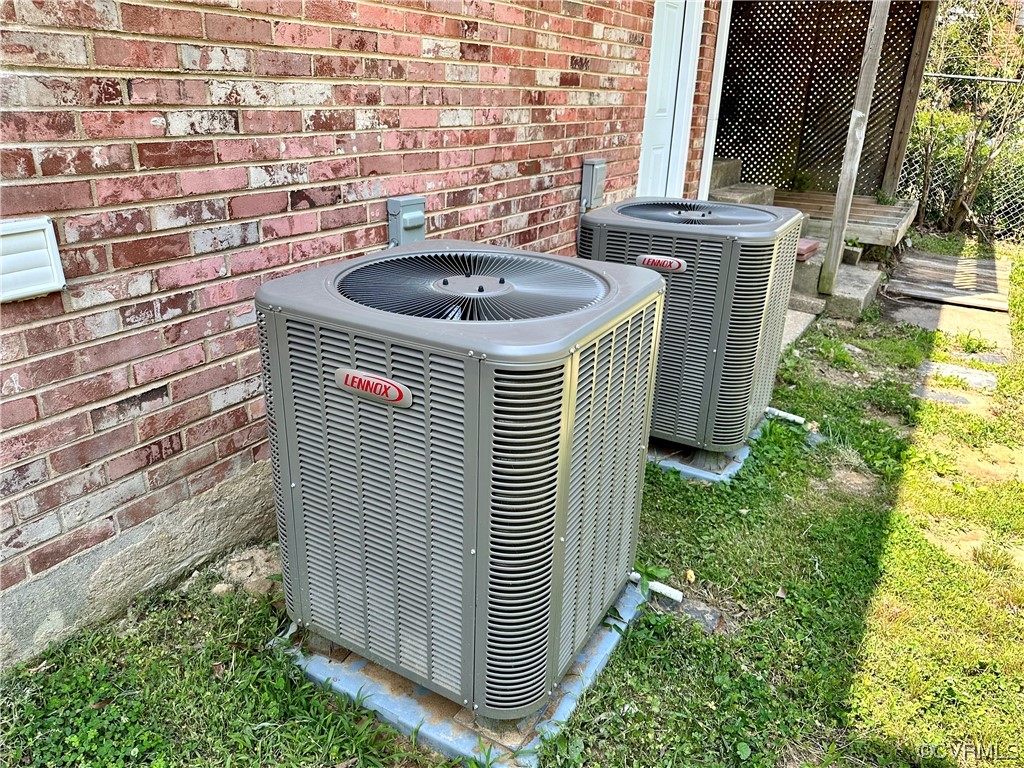 1035 Southam Drive Richmond, VA 23235 - Photo 43 of 43 a bathroom with a sink a toilet and a shower