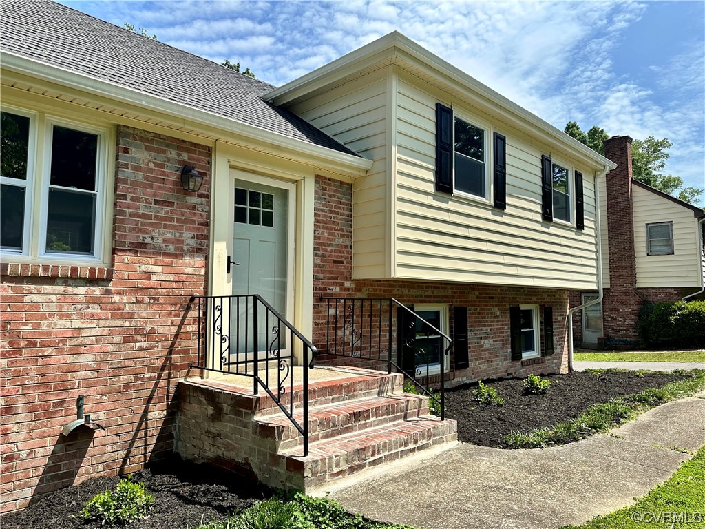 1035 Southam Drive Richmond, VA 23235 - Photo 6 of 43 front view of a house with a yard