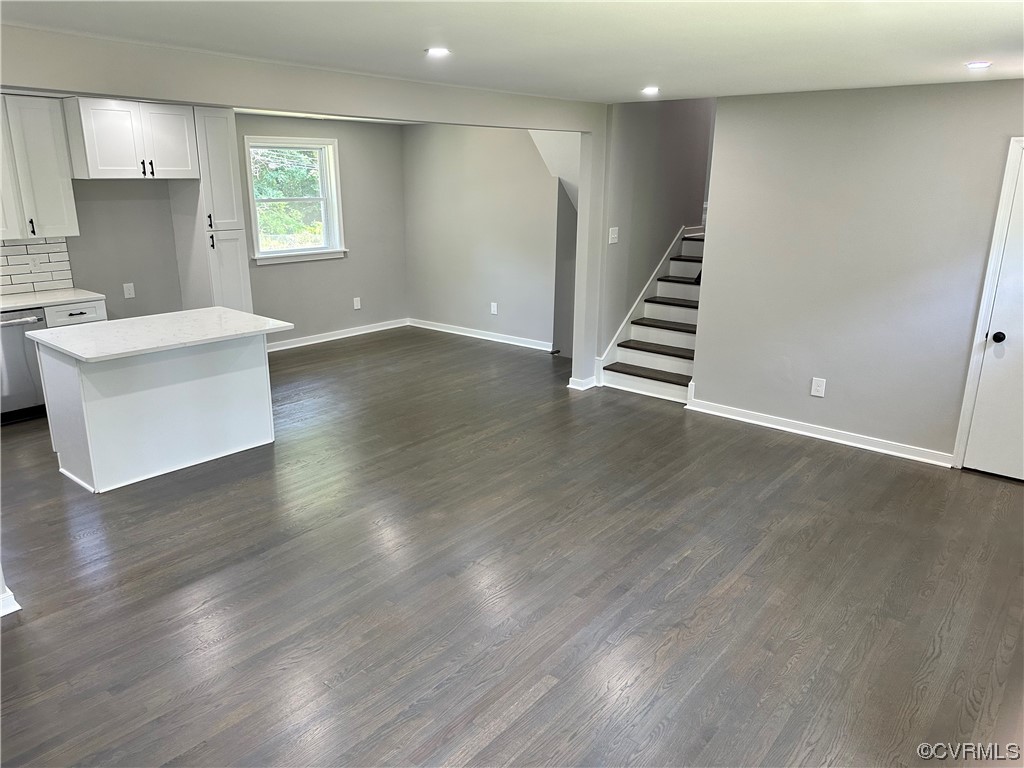 1035 Southam Drive Richmond, VA 23235 - Photo 9 of 43 a view of an empty room with wooden floor and a window