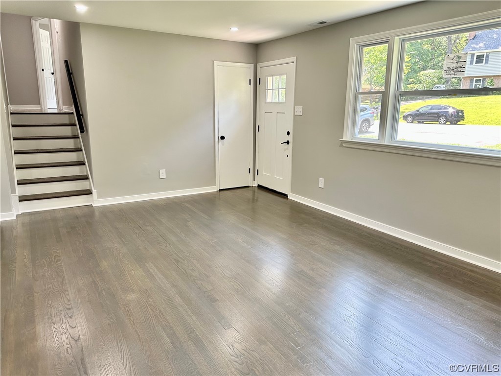 1035 Southam Drive Richmond, VA 23235 - Photo 10 of 43 an empty room with wooden floor and windows