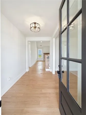 a view of empty room with ceiling fan
