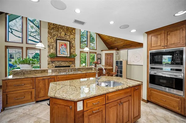 a view of a fireplace with wooden frame